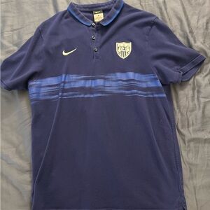 Nike USA US Soccer Blue Polo Shirt with Dynamic Stripe Design